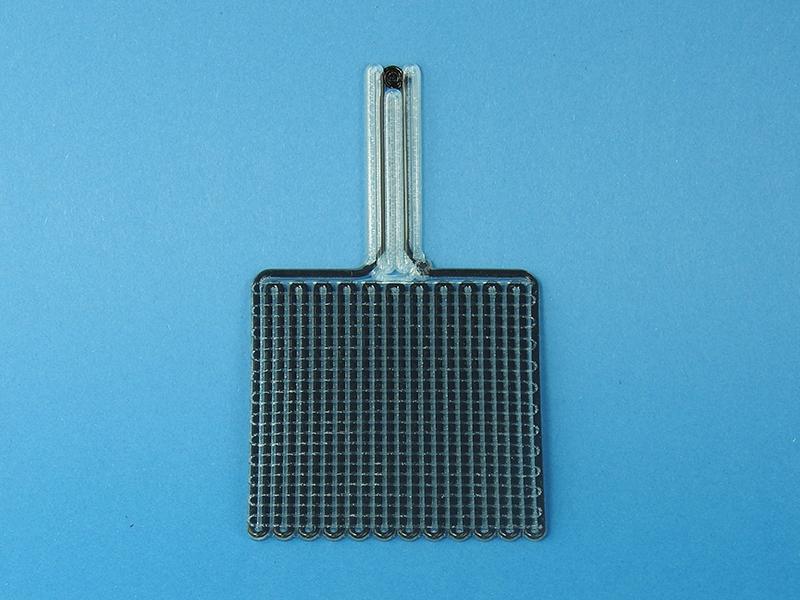 Zweikomponentige Elektrode; leitend (Schwarz) - isolierend (transparent), medizinische Elektrode